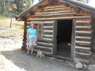 Robin and Teddy at the cabin her great grandfather built in 1899