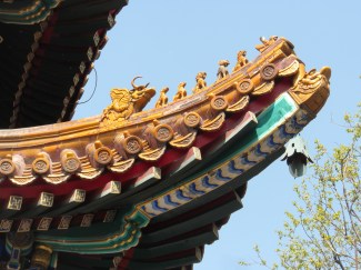 The number of figures, from five to nine, on the roof corners indicate the importance of the building.