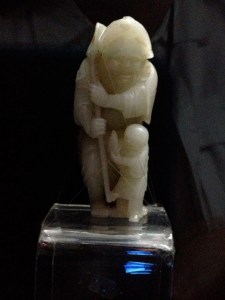 A jade carving of a fisherman and a boy