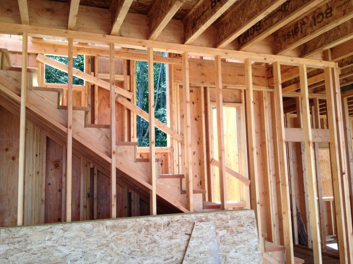Vertical windows along the stairway to the loft