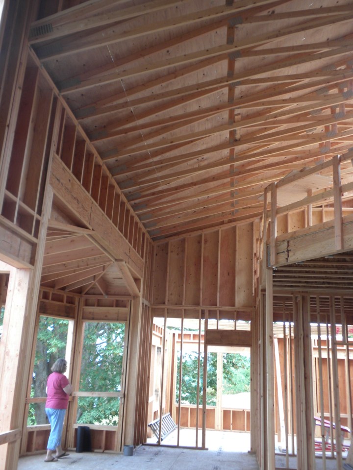Looking from the living room toward the study. Robin is standing in the dining room.