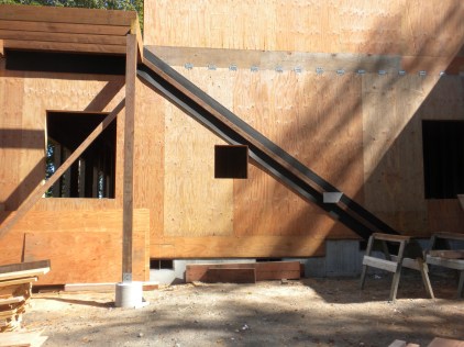 Where the outside stairs will go on the side of the house, with a window now added to the guest bathroom