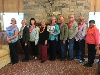 The Tuttle cousins now, with Robin holding the old photo