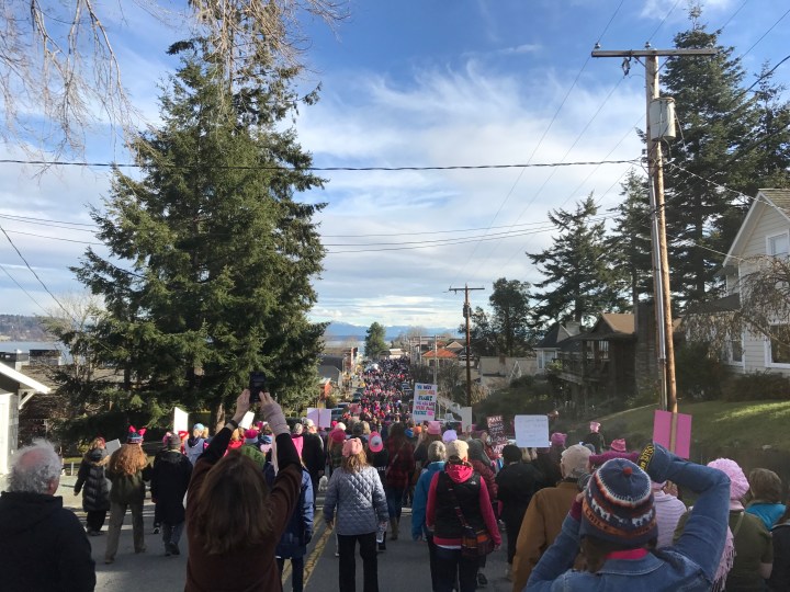 The women's march passes through downtown Langley.
