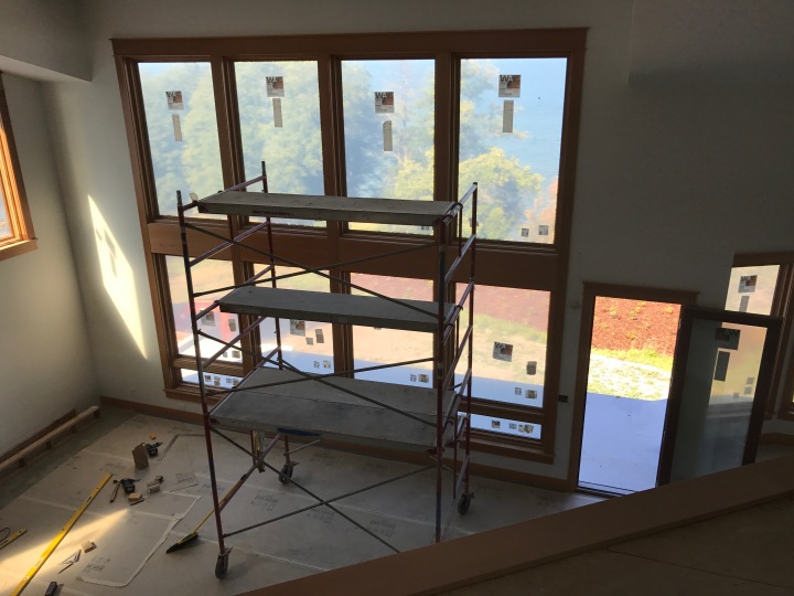 Living-room windows with all the trim in place. They'll look better when the scaffolding is removed.