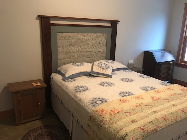 Headboard and bedside tables in the back guest room.