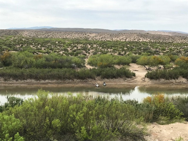 The Rio Grande, with a couple of canoes waiting no doubt to make an "illegal crossing."