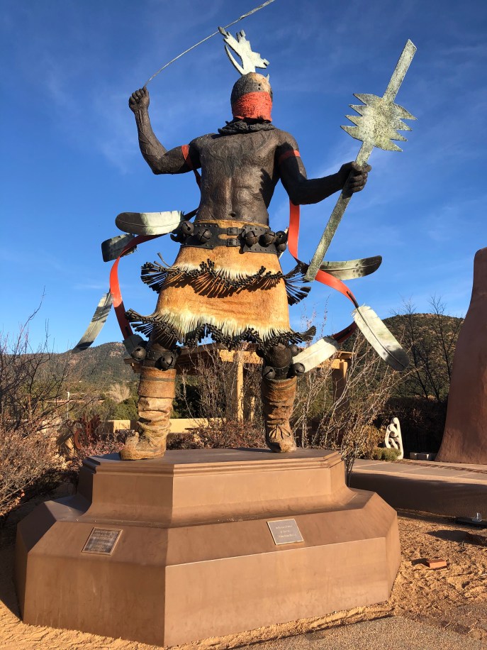 The Apache Mountain Spirit Dancer, in bronze, is the largest of the sculptures on Museum Hill.