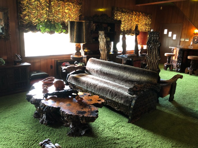 The "jungle room." com plate with green shag carpet